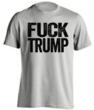 White t-shirt with 'FUCK TRUMP' printed in black on a white background